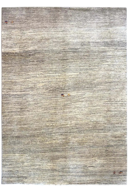 Rug with a rectangular shape, a beige to gray base, and an even linear relief pattern
