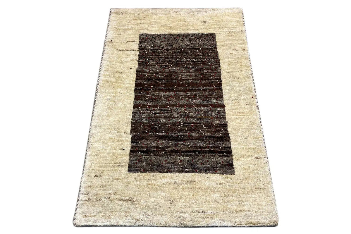 Gabbeh rug 87x55 cm: beige rug with a dark central rectangle
