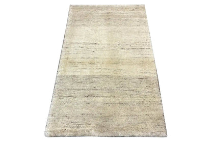 Rug 102x63 cm, rectangular, light beige with a subtle texture and linear pattern