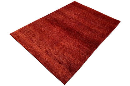 Gabbeh rug 151x106 cm, red woven rug, rectangular, from another perspective
