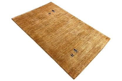 Gabbeh rug 122x78 cm, honey brown with two blue motifs, woven top side