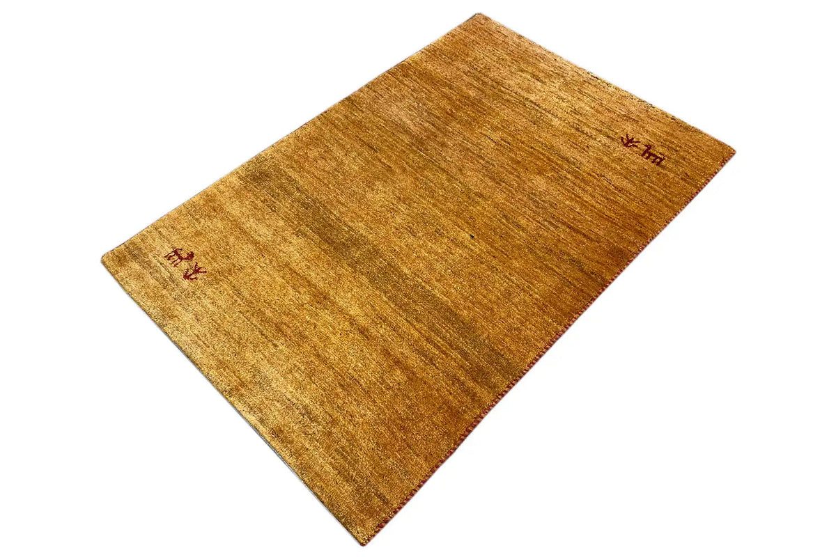 Carpet 122x80 cm, brown-gold, spread out at an angle, red symbols in the corners