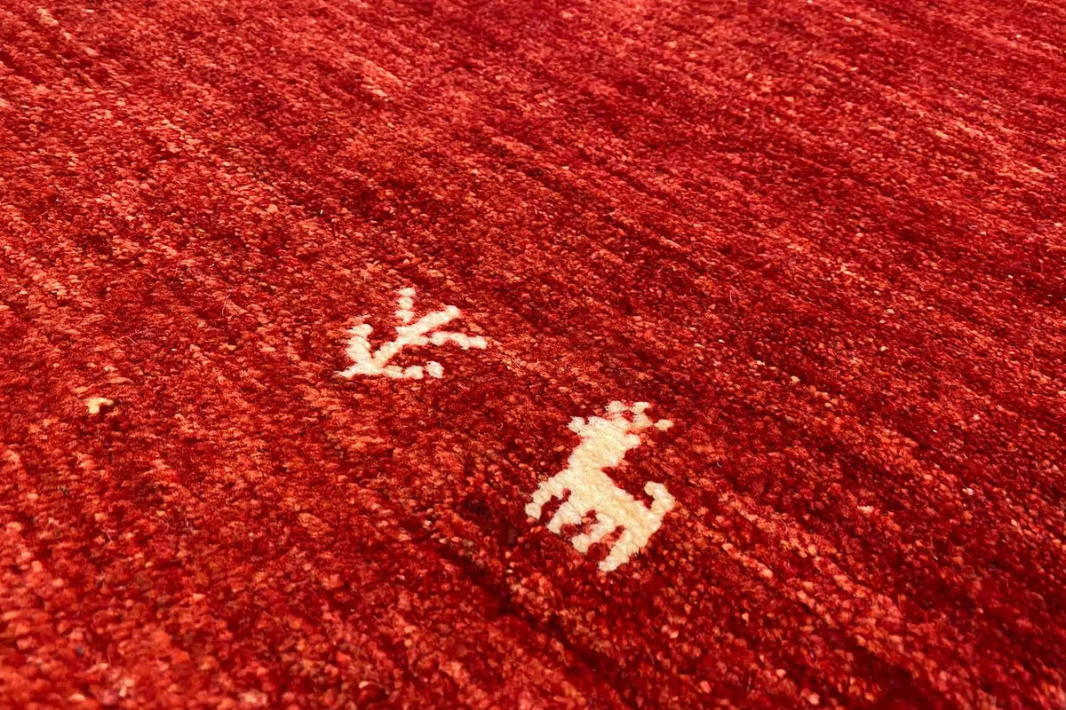 Gabbeh rug 142x69 cm, close-up of red surface with white motif