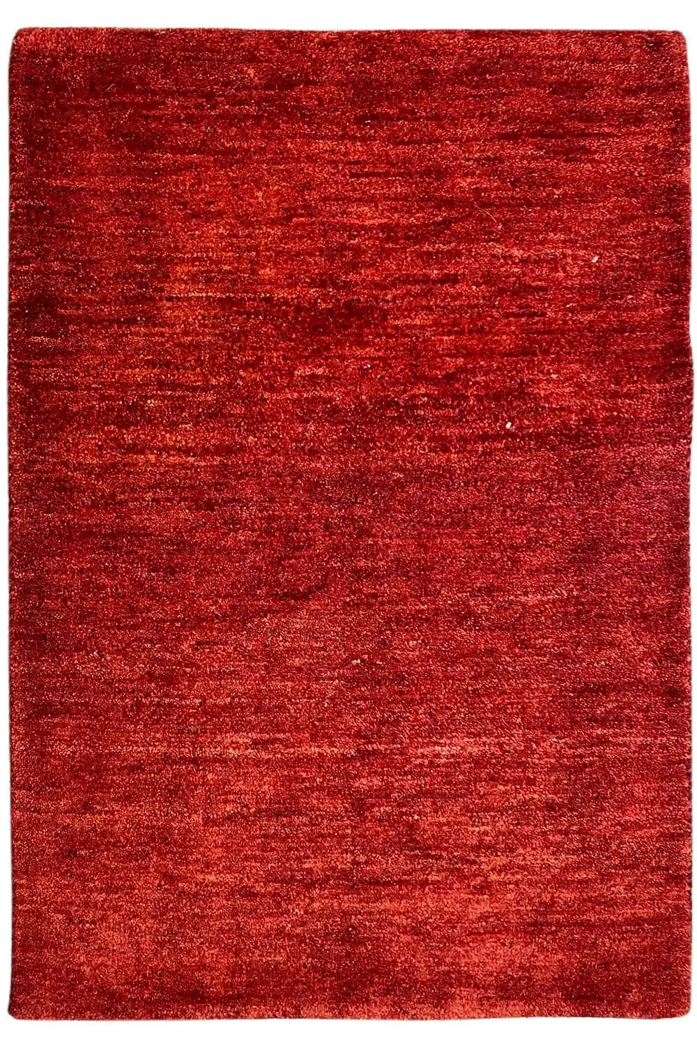 Gabbeh rug, red rectangular rug with a fine texture, approx. 110x73 cm.