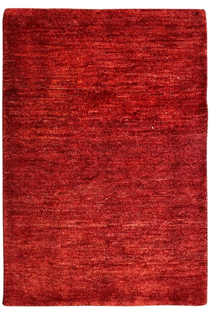 Gabbeh rug, red rectangular rug with a fine texture, approx. 110x73 cm.