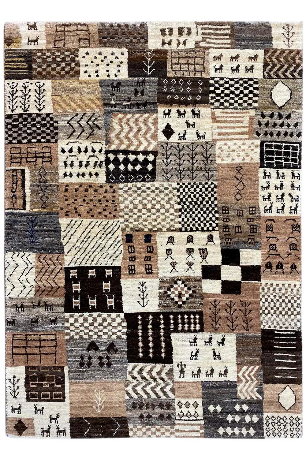 Gabbeh rug, large-scale patchwork of squares and symbols in beige, brown, and black
