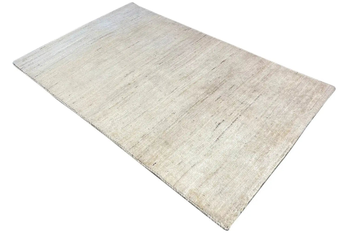 Gabbeh rug 174x110 cm, light beige, subtle linear pattern across the surface