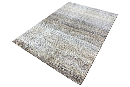 Rectangular Gabbeh rug, light beige with gray stripes and a subtle texture