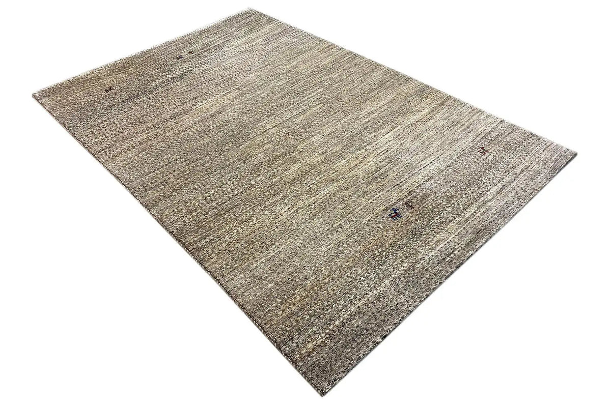 Rectangular beige-gray Gabbeh rug with a subtle striped texture