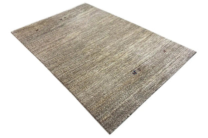 Rectangular beige-gray Gabbeh rug with a subtle striped texture