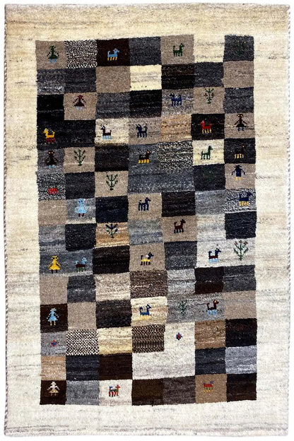 Gabbeh rug, straight, diamond patchwork of beige and dark fields with animal figures