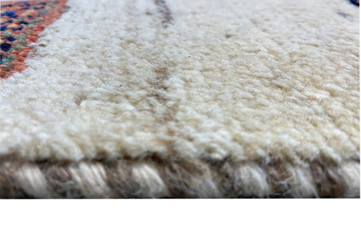 Gabbeh rug with a dense pile, close-up of the red texture