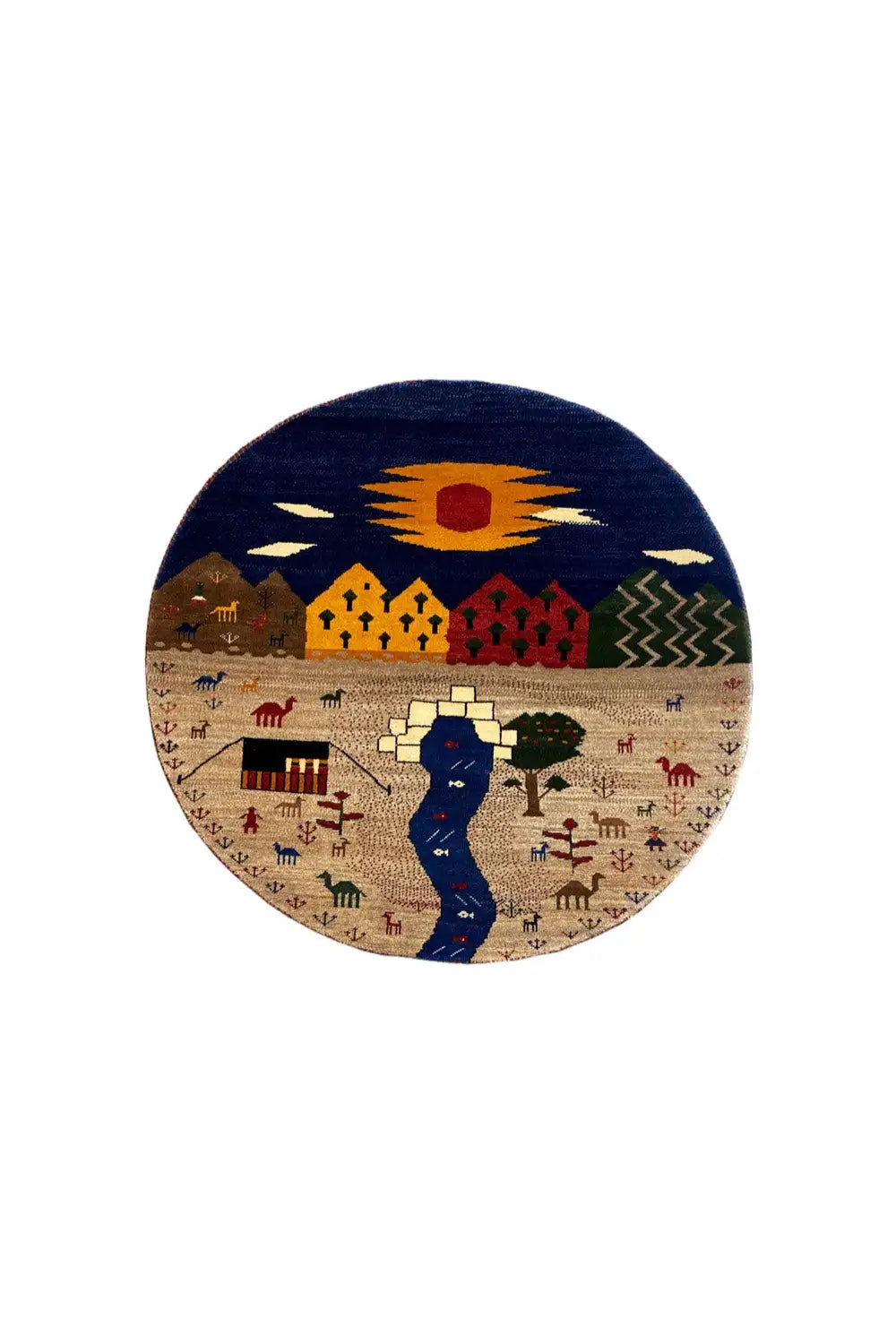 Round Gabbeh rug: beige surface with a blue horse, sun and zigzag pattern