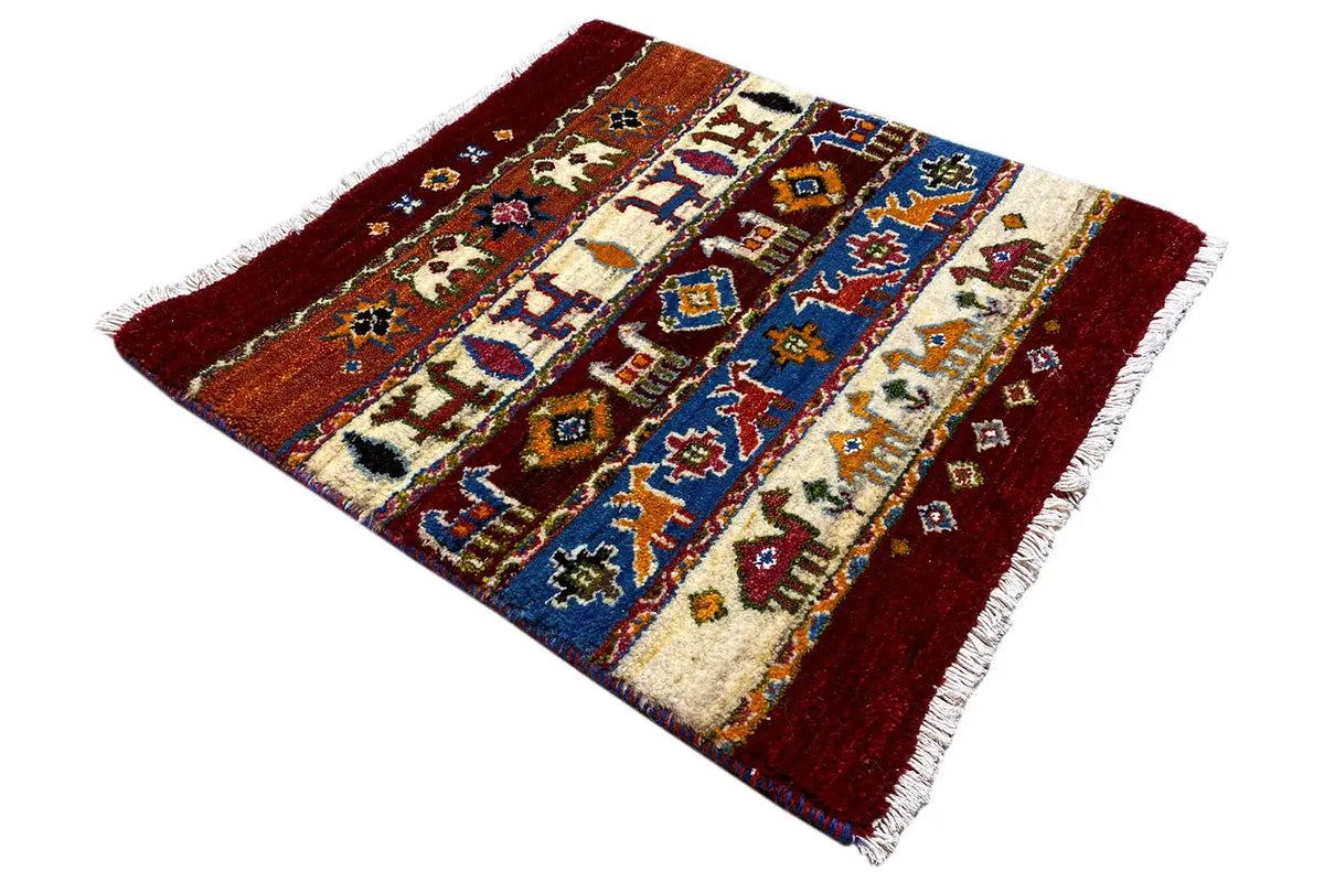 Gabbeh-Lori rug, burgundy border, light areas with colorful ornaments, fringes
