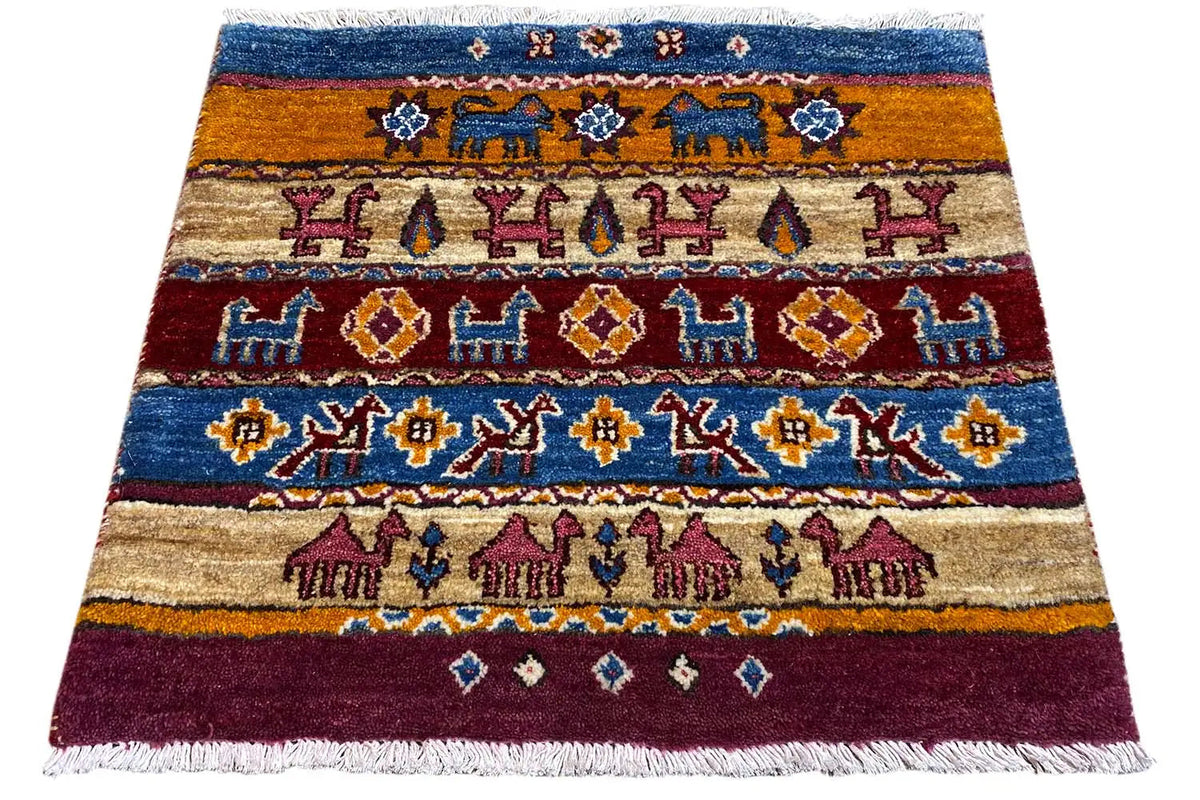 Gabbeh Lori rug with geometric patterns, blue, red, yellow and beige, fringes