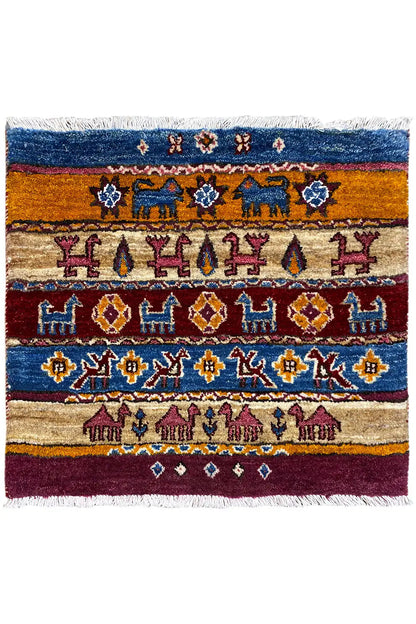 Gabbeh Lori rug with a multicolored border pattern in blue, red, and beige, fringes