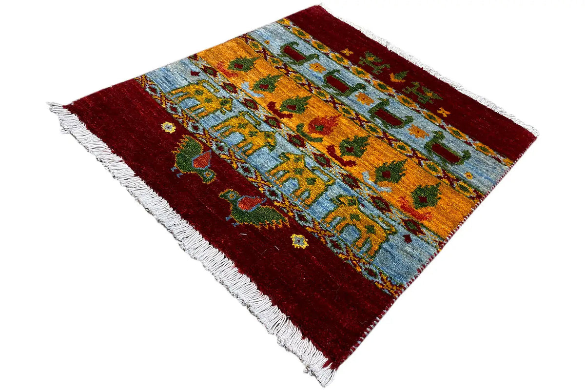 Gabbeh Lori rug 61x58 cm: nearly square view of the pattern, red and blue fields, fringes