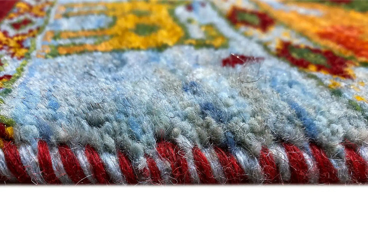 Gabbeh Lori rug 61x58 cm Detail: soft fringes and blue patterned band in red and yellow