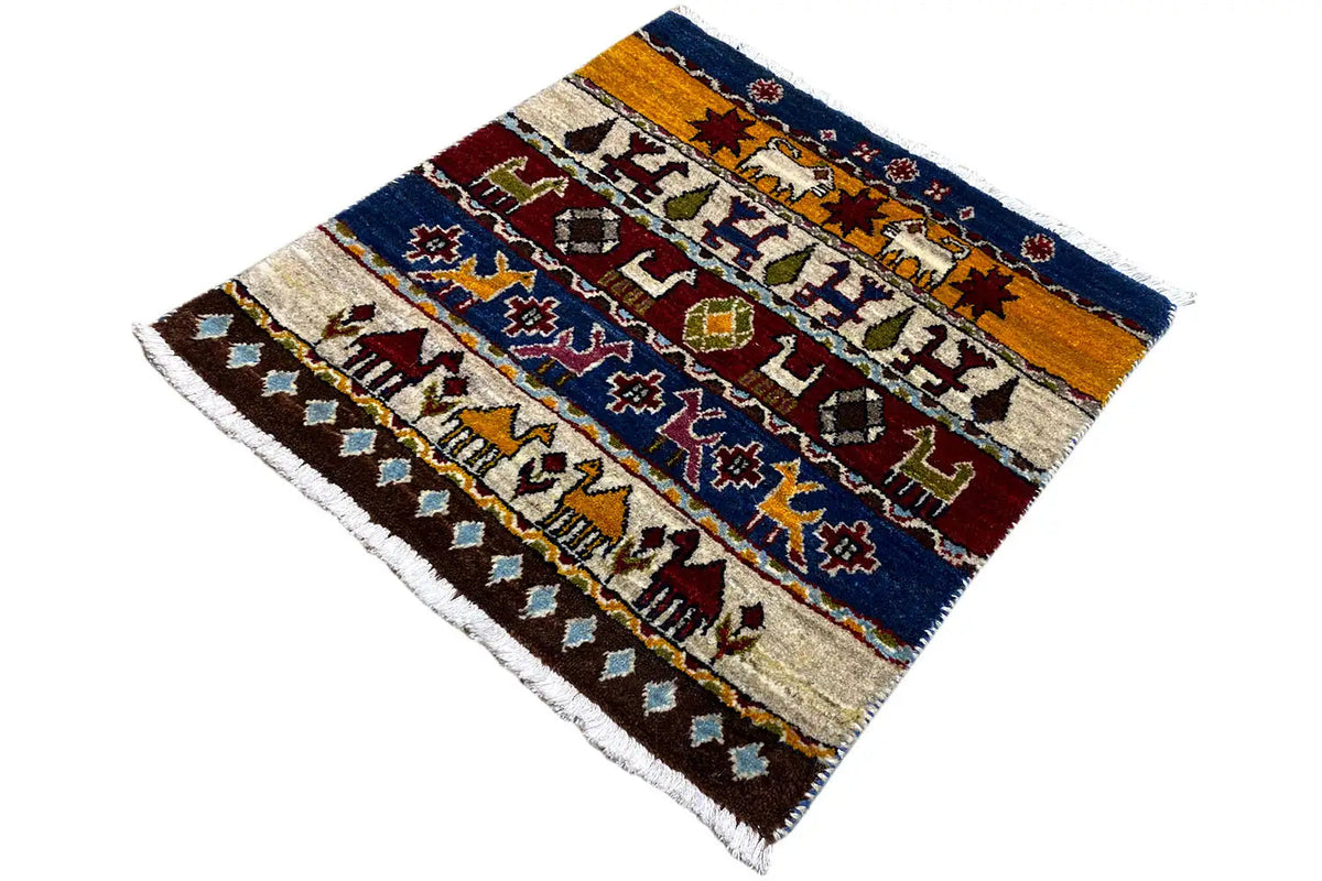 Gabbeh Lori rug 60x58 cm from an angled perspective, fringes, striped patterns