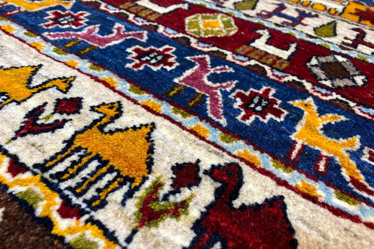 Gabbeh Lori rug 60x58 cm close-up: colorful geometric patterns and animal motifs
