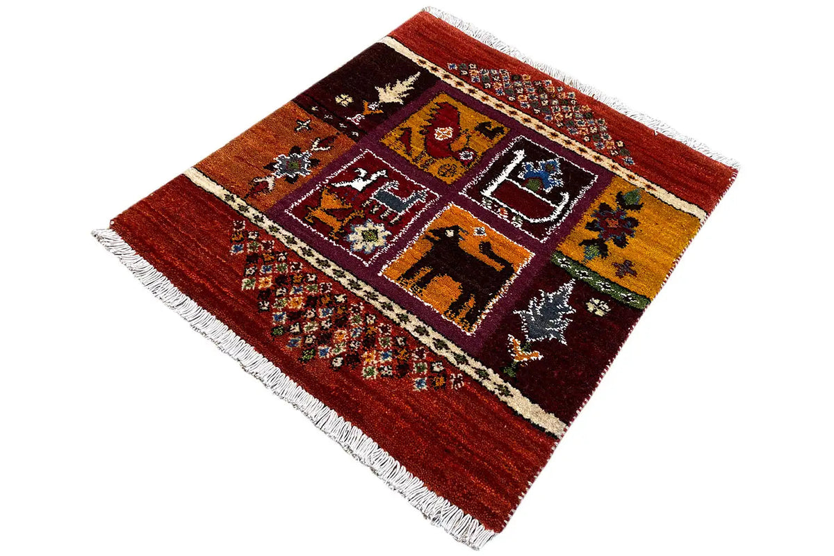 Gabbeh Lori rug 66x59 cm, red field with geometric squares and fringed edges