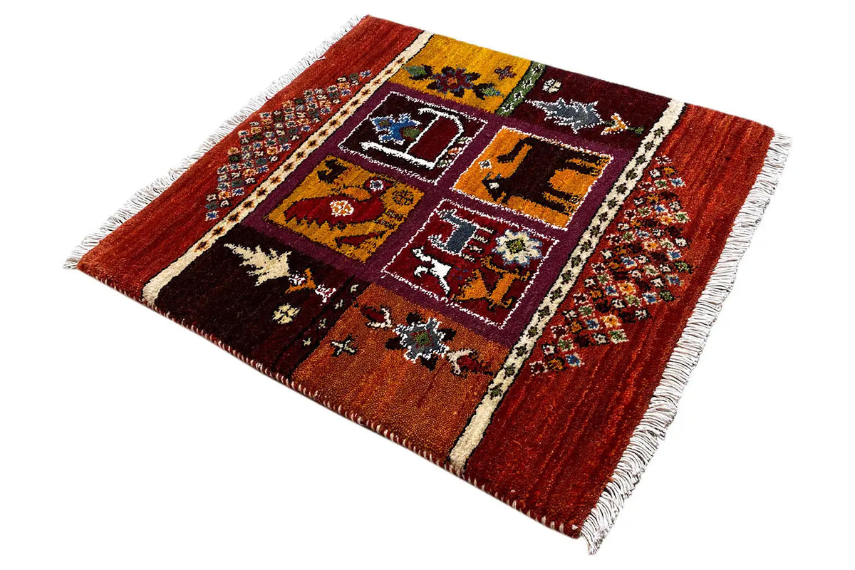 Gabbeh Lori rug 66x59 cm, red pattern with centered medallion and fringes