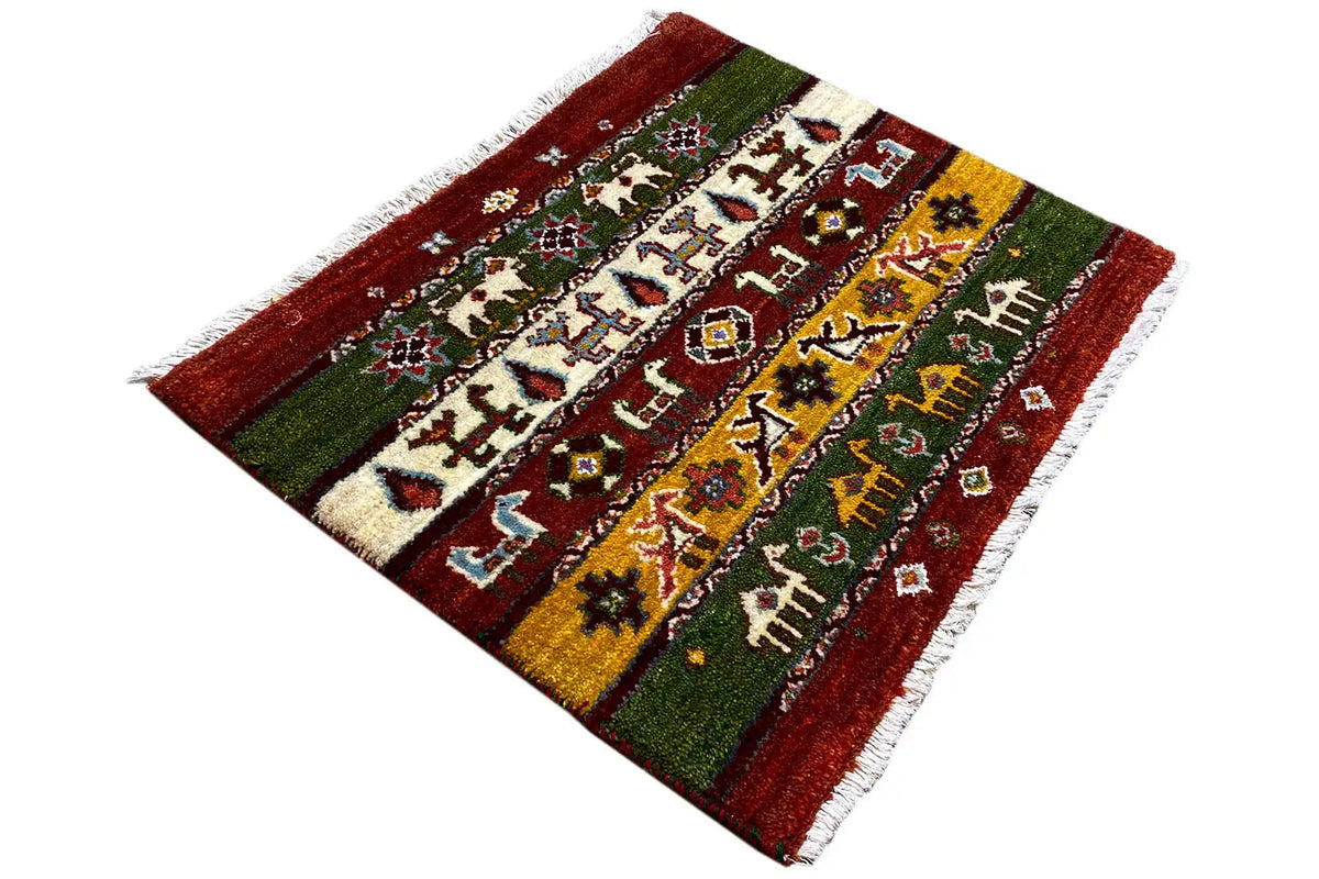 Gabbeh Lori rug, 55x64 cm: side view, multicolored borders and ornaments