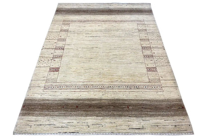 Gabbeh Lori rug in a rectangular shape with an all-around border in light beige and brown