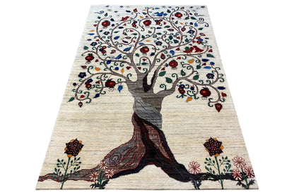Rectangular Gabbeh rug with tree and flowers, cream-colored, colorful ornamentation