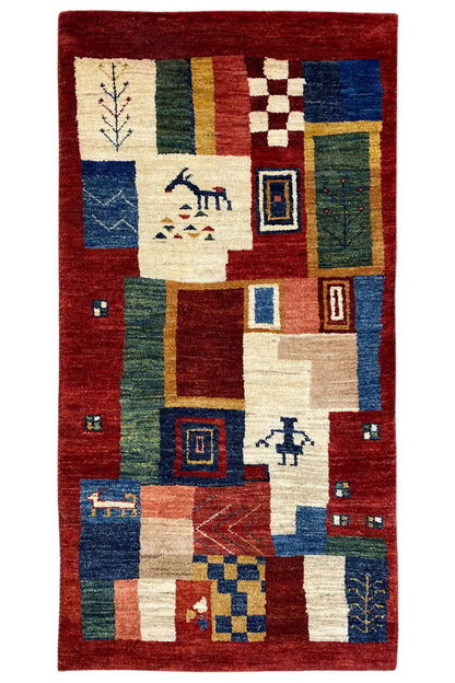 Lori Gabbeh rug 110x54 cm with patchwork pattern, border, and geometric motifs.