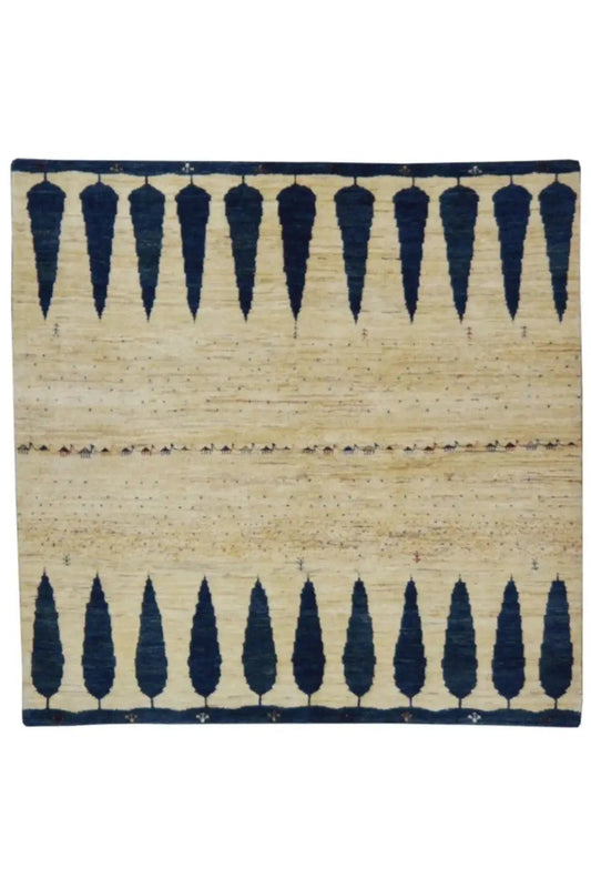 Rectangular Gabbeh rug with a beige base and dark blue ornamental border stripes