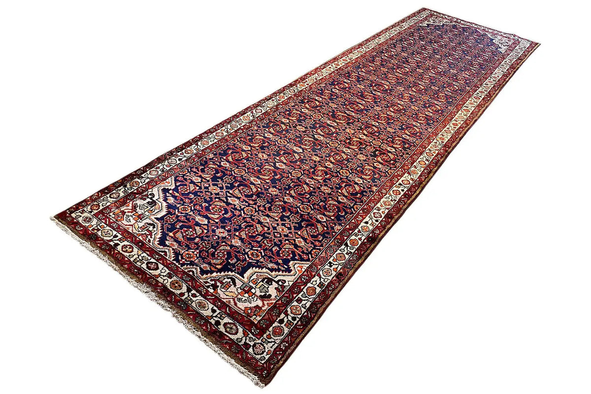 Hamadan runner 408x120 cm, laid at an angle, red-and-blue ornamental borders with a light frieze