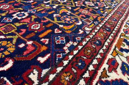 Hamadan runner, 325x110 cm, detailed view: blue pattern with red and yellow motifs