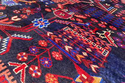 Close-up: dark blue runner with a red, blue, and white ornamental pattern