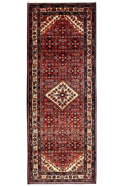 Rectangular Hamadan rug with a burgundy background, borders, and medallion