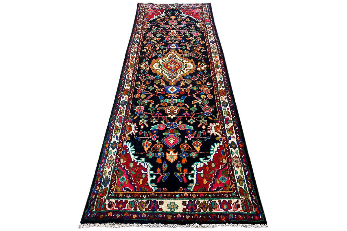 Oriental rug runner, narrow rectangular, colorful pattern with decorative borders