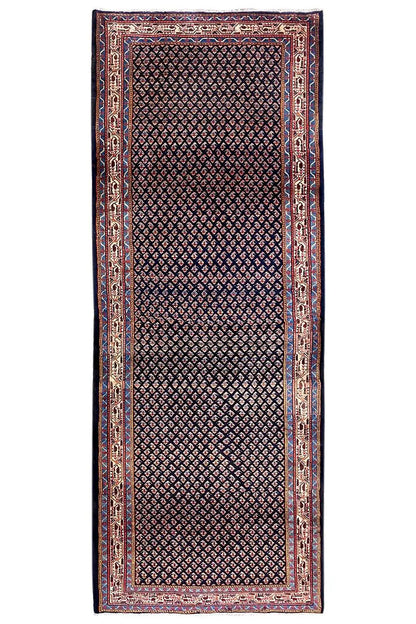 Oriental rug runner with rectangular border in blue, red, and beige, 311x115 cm