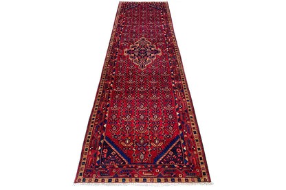 Hamadan runner 369x108 cm with a red background, blue central motif, and framed border