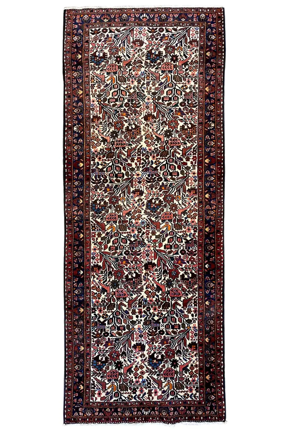 Runner rug (295x109 cm) with an overall rectangular design, dark border and ornamentation