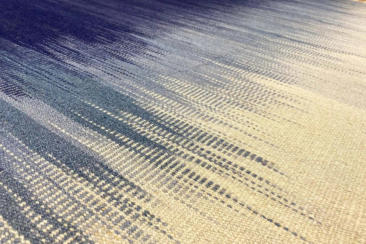 Kelim dhurrie rug with a striped woven pattern in blue and beige