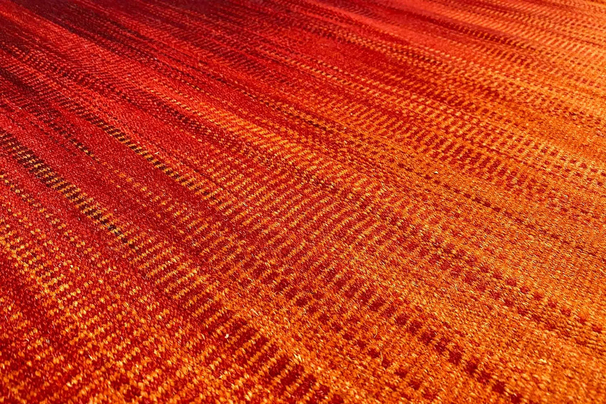 Modern kilim dhurrie rug, orange-brown wave pattern, tightly woven