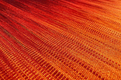 Modern kilim dhurrie rug, orange-brown wave pattern, tightly woven