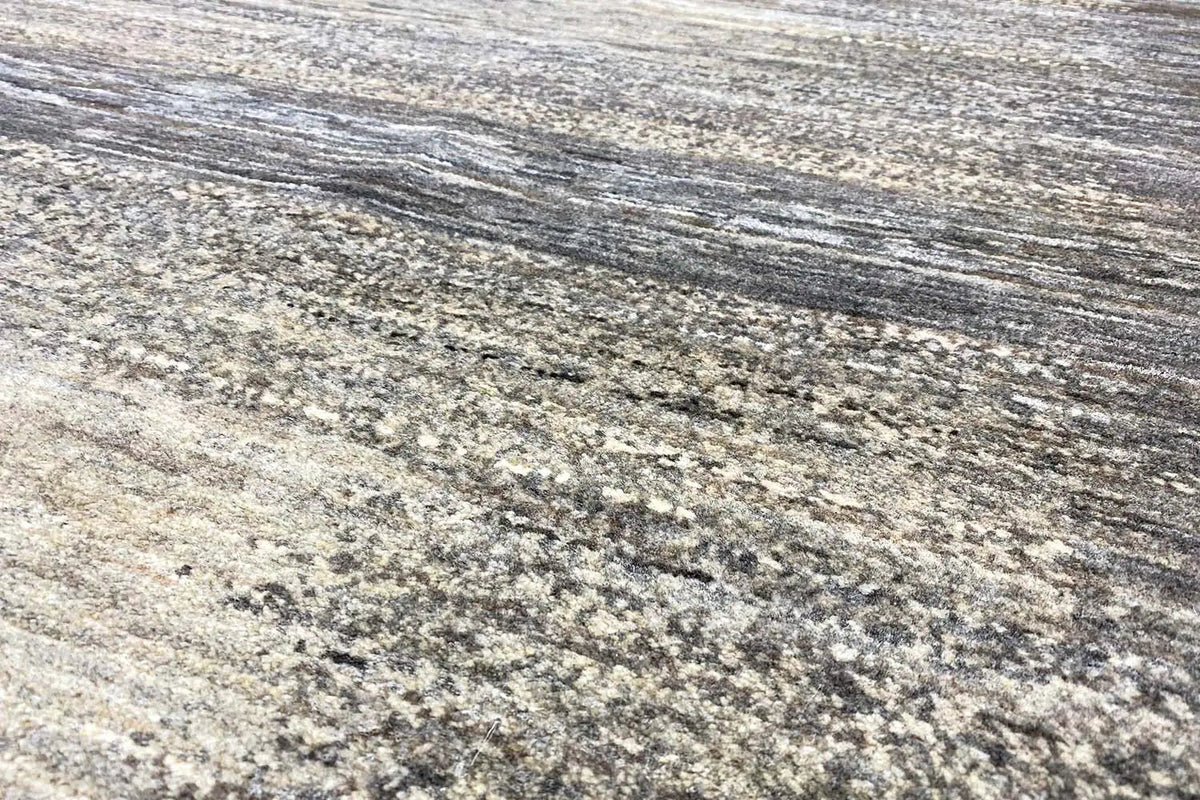 Gabbeh Lori rug: patterned pile in beige, gray, and dark gray, close-up