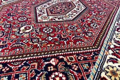 Bidjar rug (92x60 cm) with a red, blue, and cream ornamental pattern