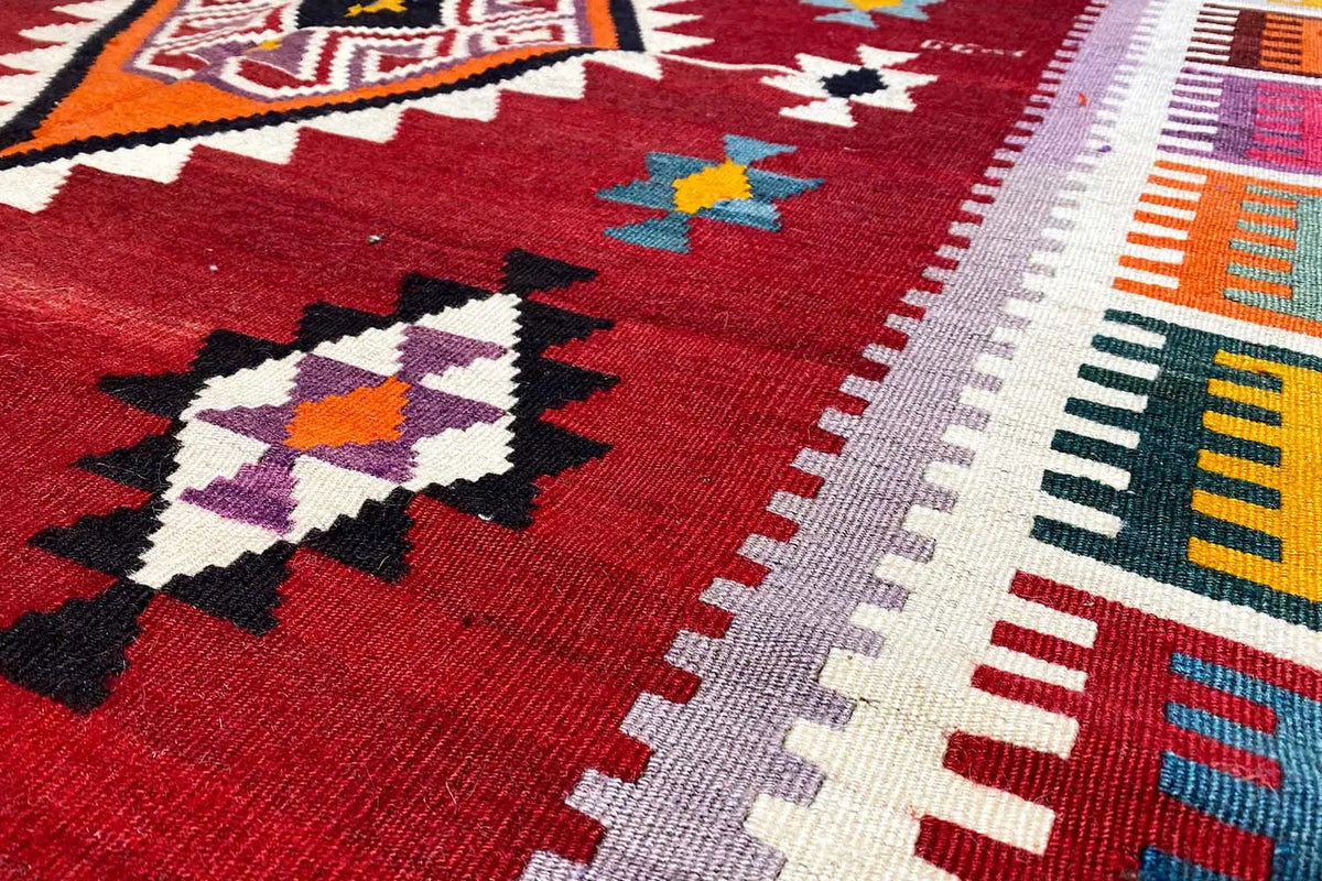 Kilim Qashqai rug, red pattern with geometric shapes and borders