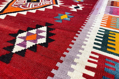 Kilim Qashqai rug, red pattern with geometric shapes and borders