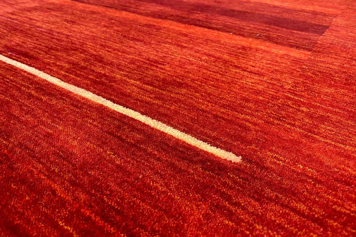 Gabbeh rug with diagonal stripes in reddish brown, close-up view