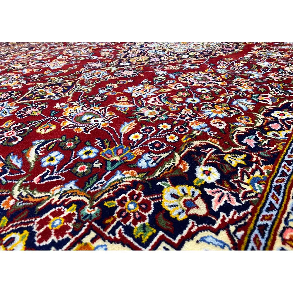 Keshan rug with an oriental pattern, burgundy and blue ornaments with colorful details.