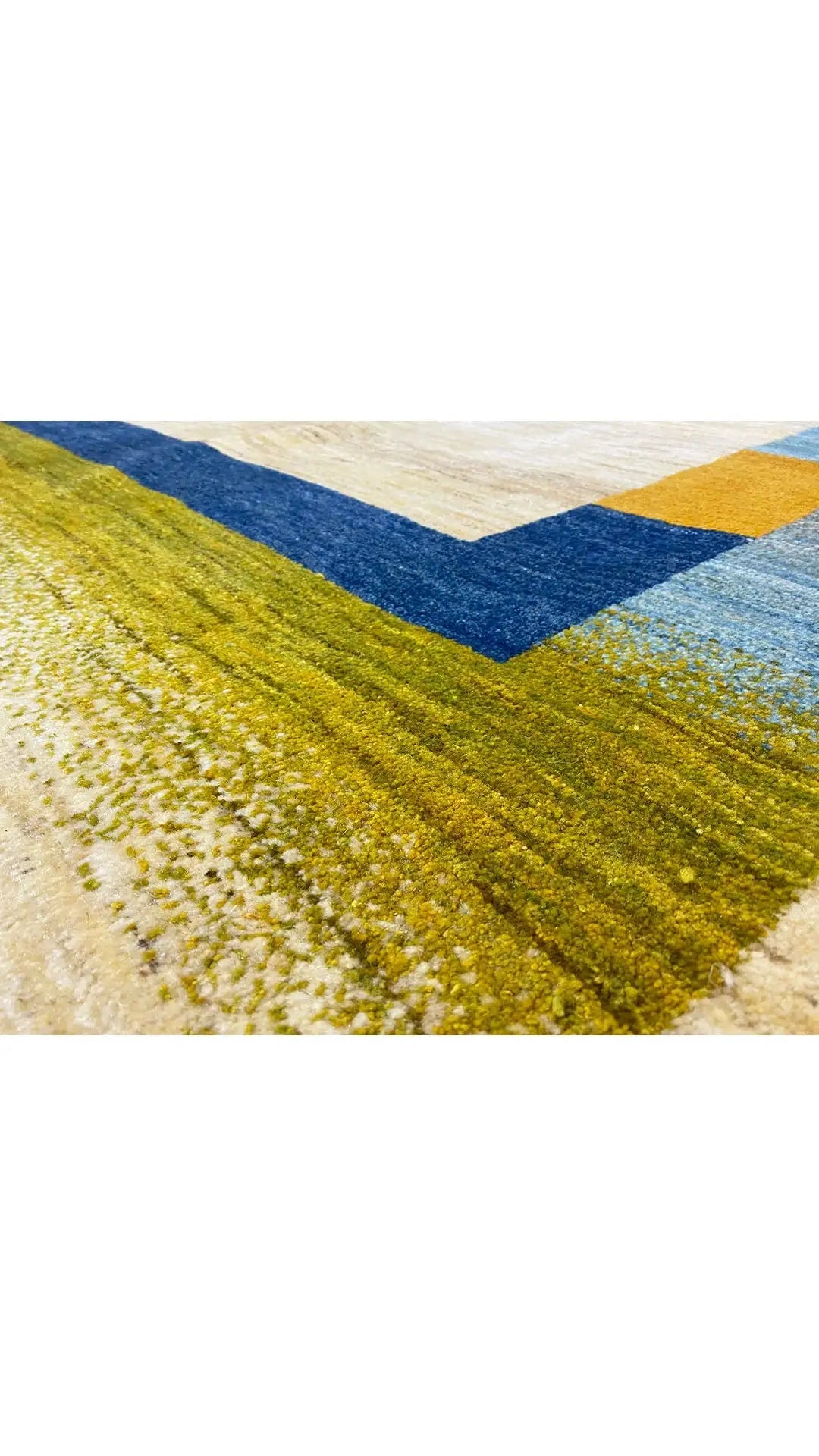 Gabbeh rug 195x150 cm with a geometric pattern in blue, green, and yellow