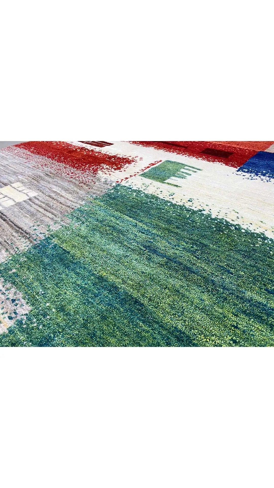 Gabbeh rug with a blue-green-red geometric pattern, brushed pile texture